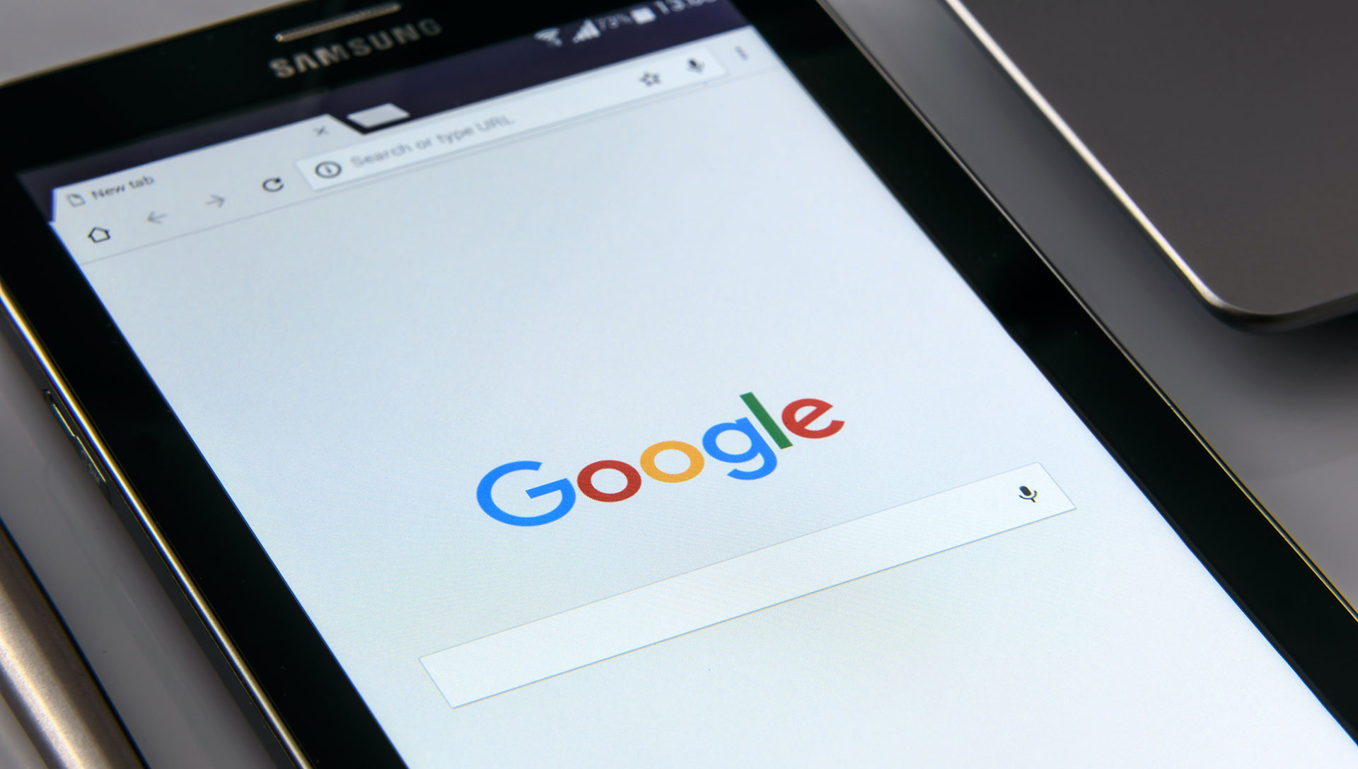 king-and-country-google-marketing-header tablet with google search engine on it