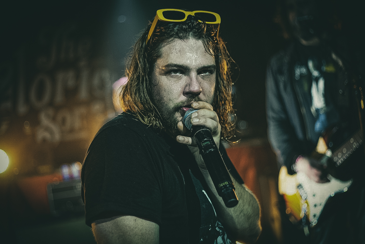an image of brett emmons of the glorious sons photographed by king & country performing at stages in kingston